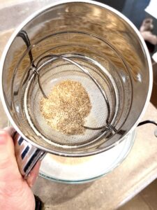 Wheat bran has been sifted out of the flour and can be used in other recipes. 